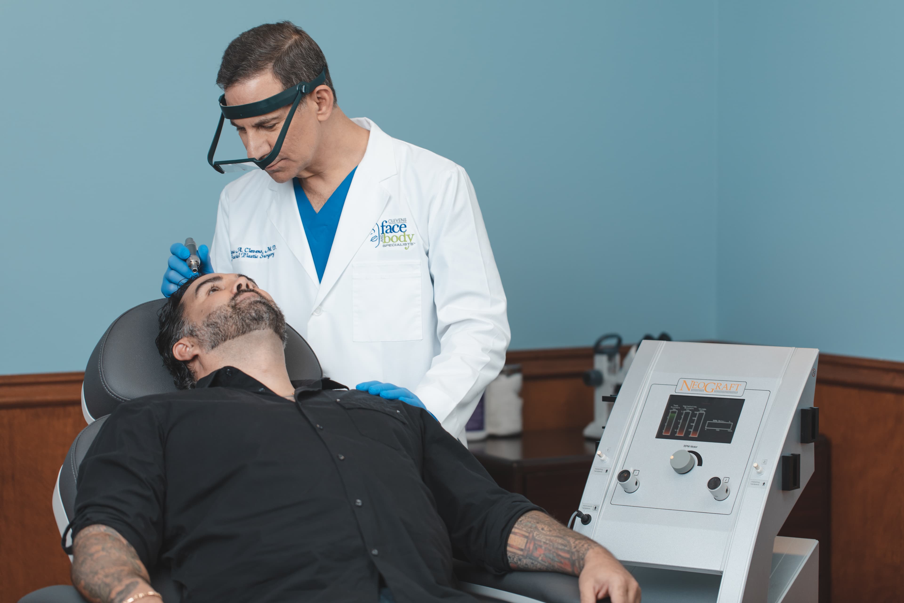 Dr. Ross Clevens performing a NeoGraft hair transplant in his Melbourne, Florida practice